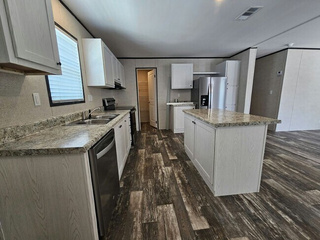 Foto del edificio - 6701 Hidden Oaks Dr