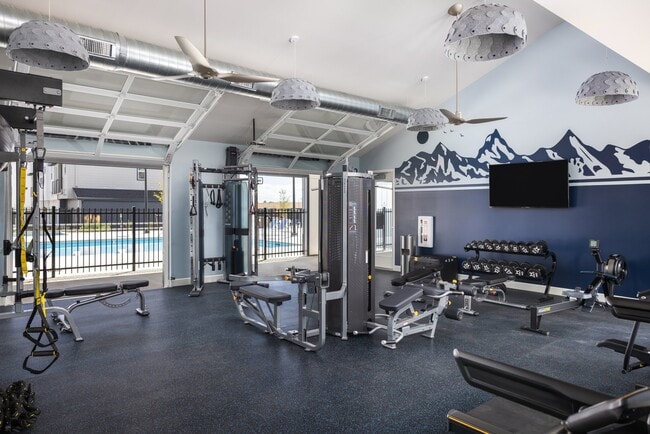 24 Hour Fitness Center with Garage Doors for Fresh Air - Finley at Baseline