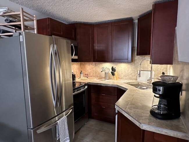 Building Photo - 9080 E 16th Ave