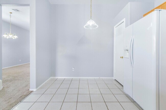 Building Photo - Upgraded 4BR Henderson Home | New Floors | Gated Community | 2-Car Garage