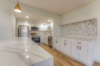 Building Photo - The Garden District Apartments