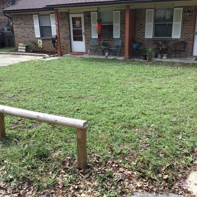 Foto del edificio - Brick Duplex Near NAS Pensacola & Corry Station with Tile Flooring Throughout and Fully Fenced Ba...