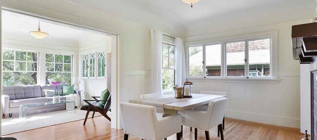 Dining room w/decorative fireplace - 2644 Benvenue Ave
