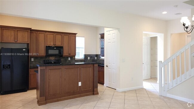 Building Photo - 6033 NW 118th Dr