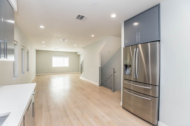 Building Photo - Contemporary Multi-Level Townhome - Prime ...