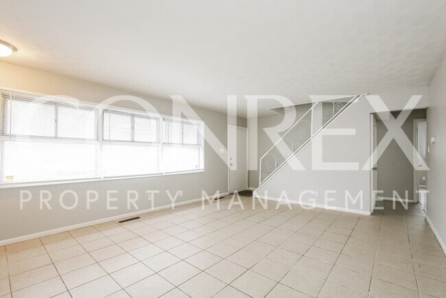 Foto del edificio - 6115 E 39th St