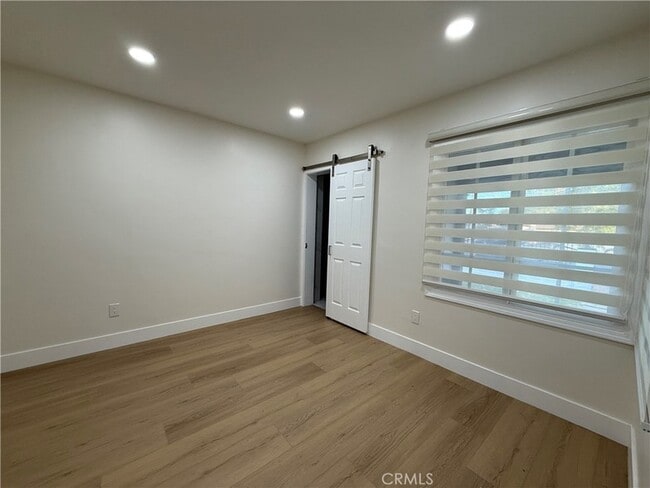 Building Photo - 9123 Woodley Ave