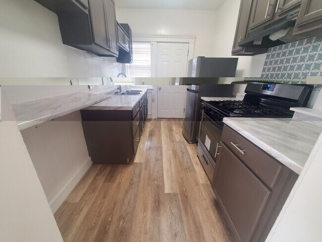 Foto del edificio - 1446 E 115th St
