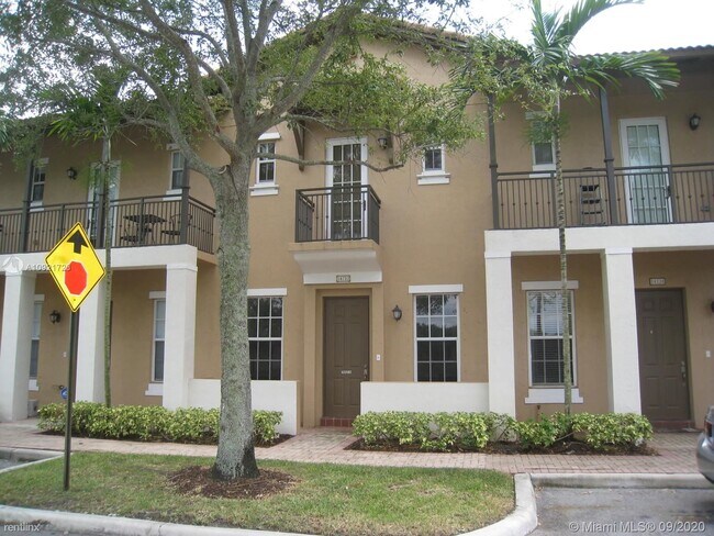 Building Photo - 2 br, 2.5 bath Townhome - 14630 SW 6th St