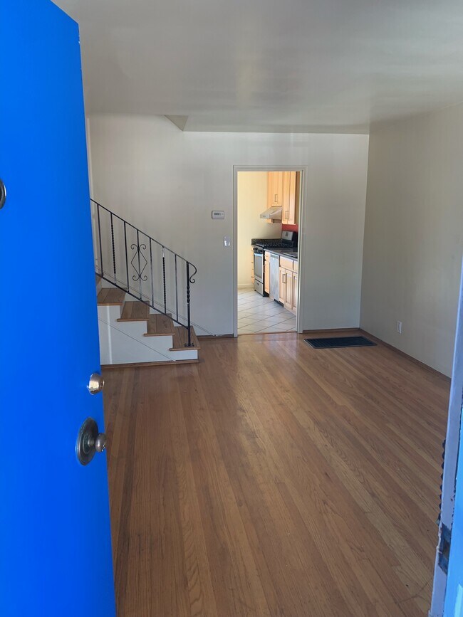 Front door opens to living room - 485A Clifton St