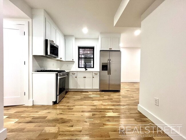 Building Photo - BRAND NEW 4 BED 2 BATH WITH W/D IN UNIT!