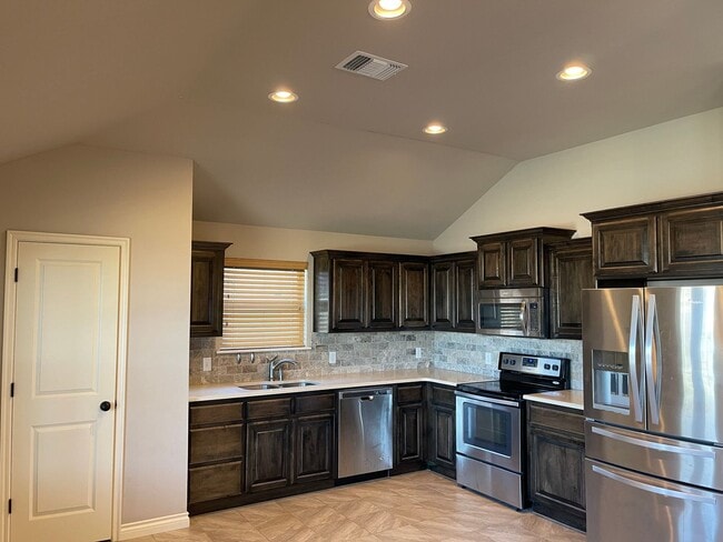 Building Photo - Neighborhood pond, playground, walking tra...