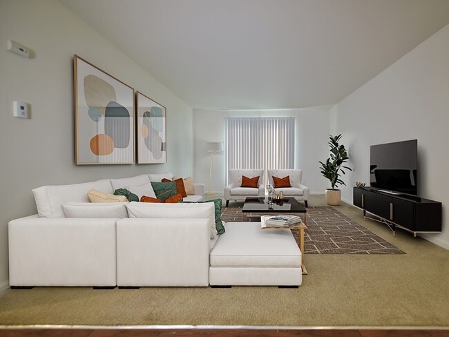 The spacious living room in Grand Bend Club Apartments. - Grand Bend Club Apartments