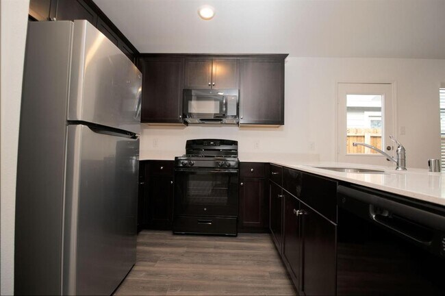 Building Photo - 5701 Manarchos Ln