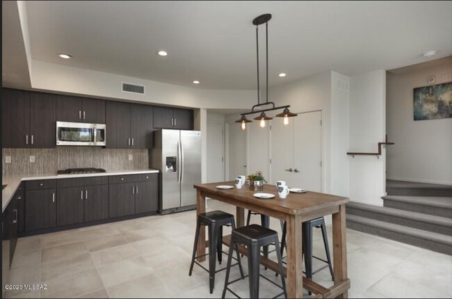 Model picture - Rental house has standard light fixture and recessed lighting - 8682 E Avant Garde Way