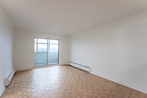 Located at 444 Victoria Rd N in Guelph, Ontario, this 2-bedroom, 1-bathroom unit offers a practical and well-organized single-floor layout. Warm parquet wood flooring flows consistently throughout the living areas and both bedrooms, lending a classic character to the space.

The living room is comfortably sized and connects to the dining area through an open pass-through, creating a cohesive shared living space. Sliding glass doors lead from the living area to a private balcony, allowing natural light to fill the room and offering views of the surrounding neighbourhood. Baseboard heating units are present throughout, ensuring comfortable warmth year-round.

The kitchen is efficiently designed with white cabinetry, grey countertops, a subway tile backsplash, and stainless steel appliances including a range with overhead microwave and a dishwasher.

The spacious primary bedroom features a large sliding-door closet and a window overlooking greenery, while the second bedroom also benefits from natural light through its own window. Both rooms are bright and finished with the same warm parquet flooring.

The bathroom is clean and well-appointed, featuring a full soaker tub and shower surrounded by crisp white subway tile and chrome fixtures. A hallway connects all rooms, completing this functional and neatly presented unit.