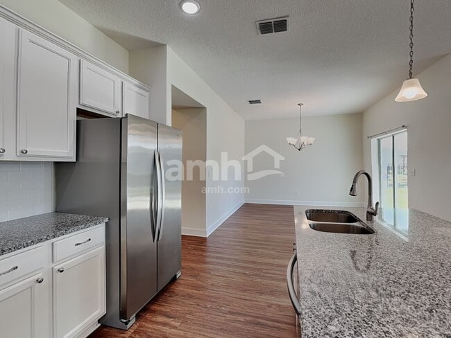 Building Photo - 2466 Ixora Ct