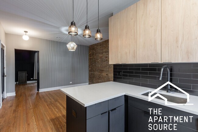 Foto del edificio - 4011 N Lowell Ave