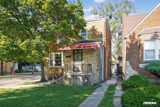 Building Photo - 7658 S Honore St