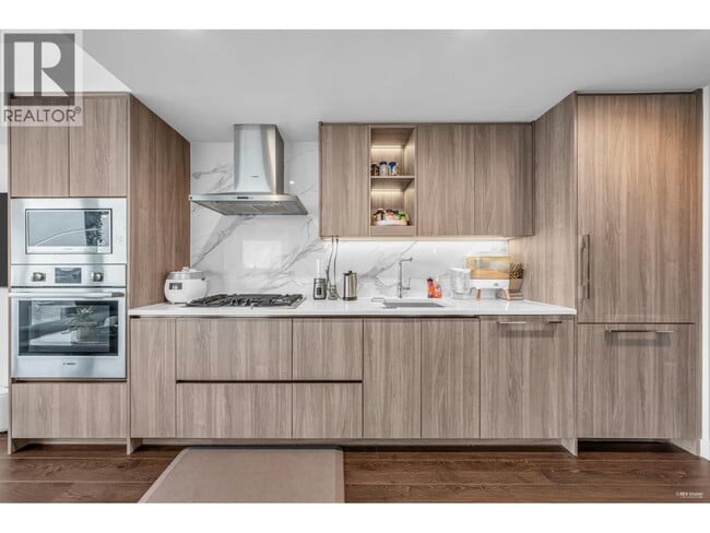 Building Photo - 4880 Lougheed Hwy.