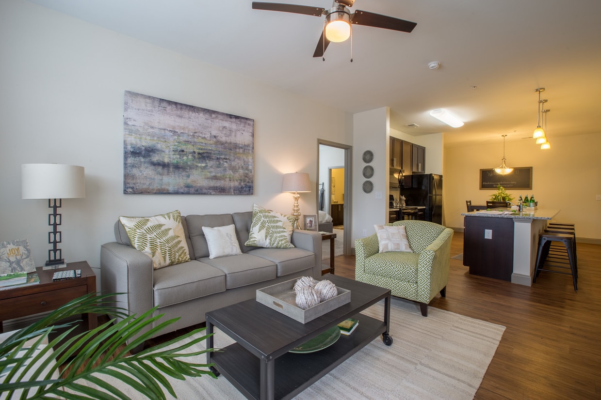 Spacious, open living room - Watercourse Apartments