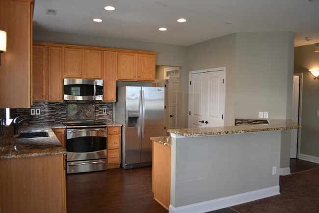 Updated kitchen with granite and stainless steel appliances - 110 E Fenway Ave