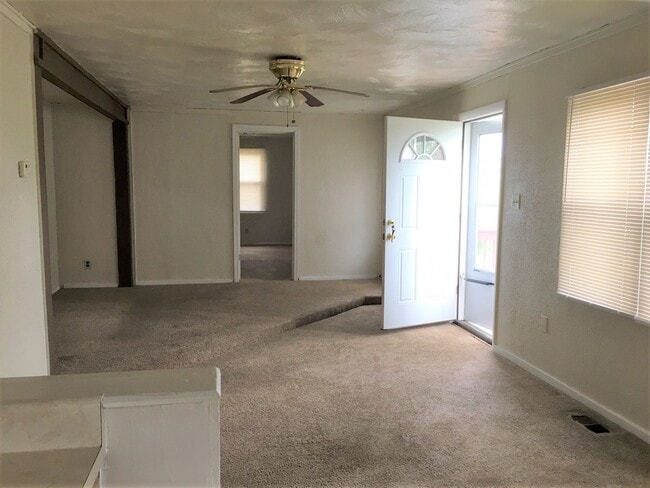 Photo - Three Bedroom Home with Main Floor Laundry on a Large Acre + Lot!!