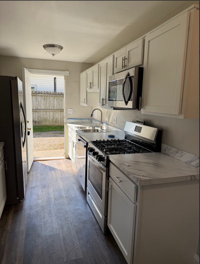 Building Photo - LAND CONTRACT (RENT-TO-OWN)