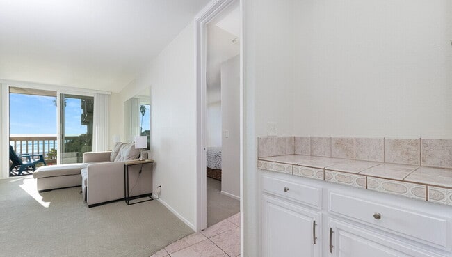 Building Photo - Coastal Living at Its Finest: Charming 1-B...