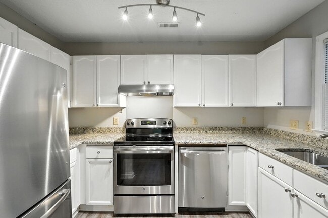 Building Photo - Spacious 2-Bedroom, 2.5-Bath End-Unit Town...