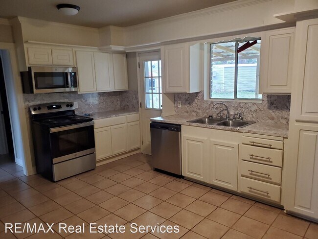 Foto del edificio - 3 br, 1 bath House - 1203 Violet