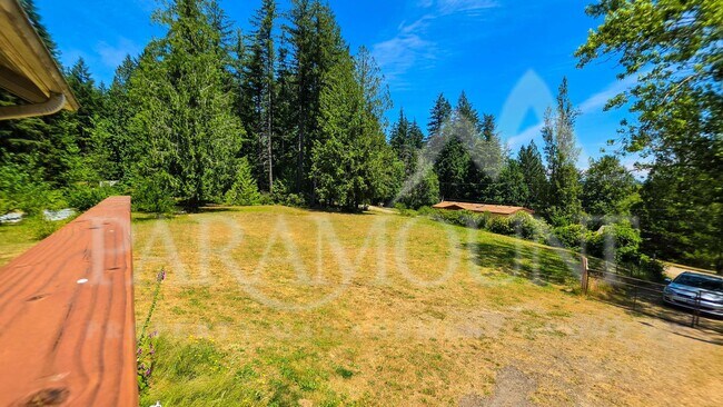 Building Photo - Spacious Log Home with Acreage!