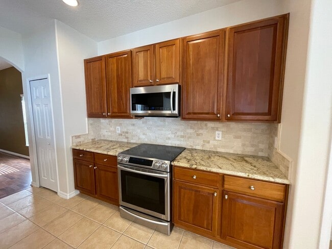 Building Photo - Live the Lake Nona Dream! Elegant 4-Bed Ex...