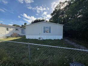 Building Photo - 12002 SW Sandalfoot Blvd