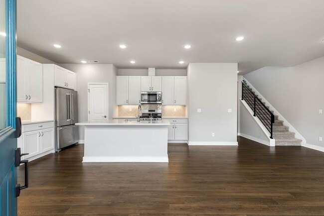 Building Photo - Beautiful River Trail 3 Bedroom Craftsman with Designer Kitchen & Spa-Inspired Primary Suite