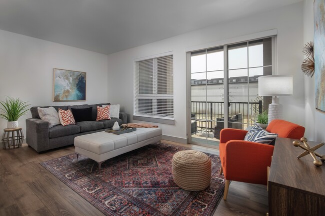 Open concept floorplans with patio or balcony - Mill District Apartments