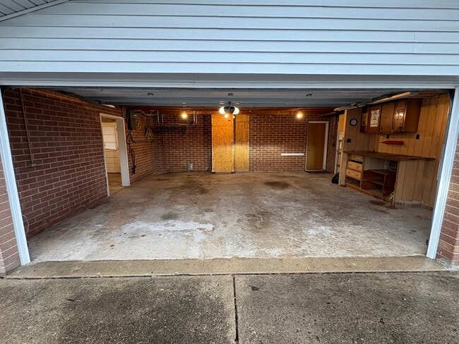 Main Garage - 504 Burgess Dr