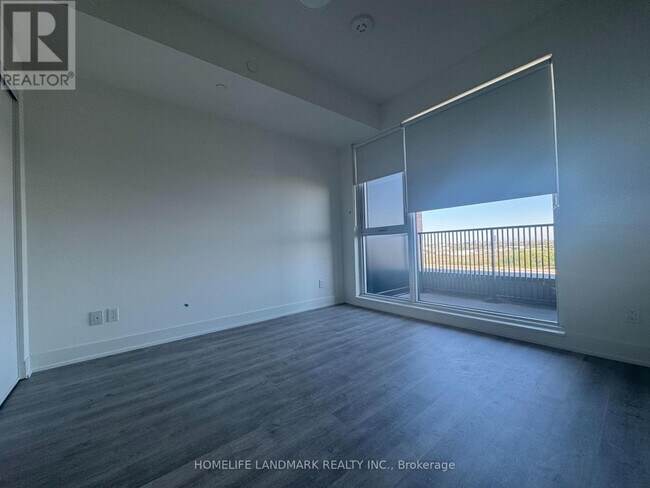 Building Photo - 38-D1738 Andre de Grasse St