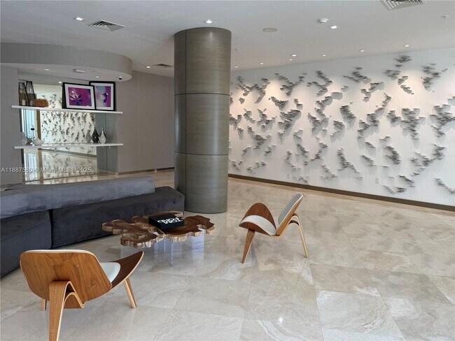 Building Photo - 10275 Collins Ave