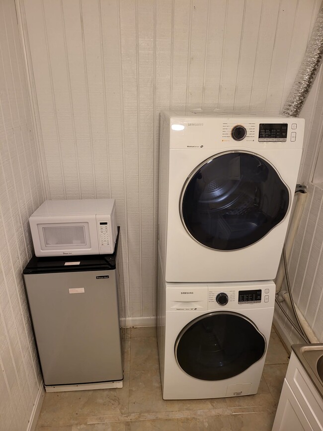 All New front-loading Samsung washer & dryer, fridge & microwave - 7839 Hidden Creek Way