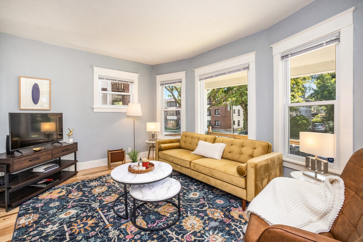 Sun filled living room with big windows - 2408 E Belleview Pl