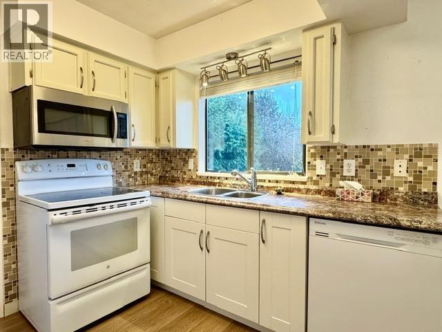 Photo du bâtiment - 5XX3 Wildwood Crescent