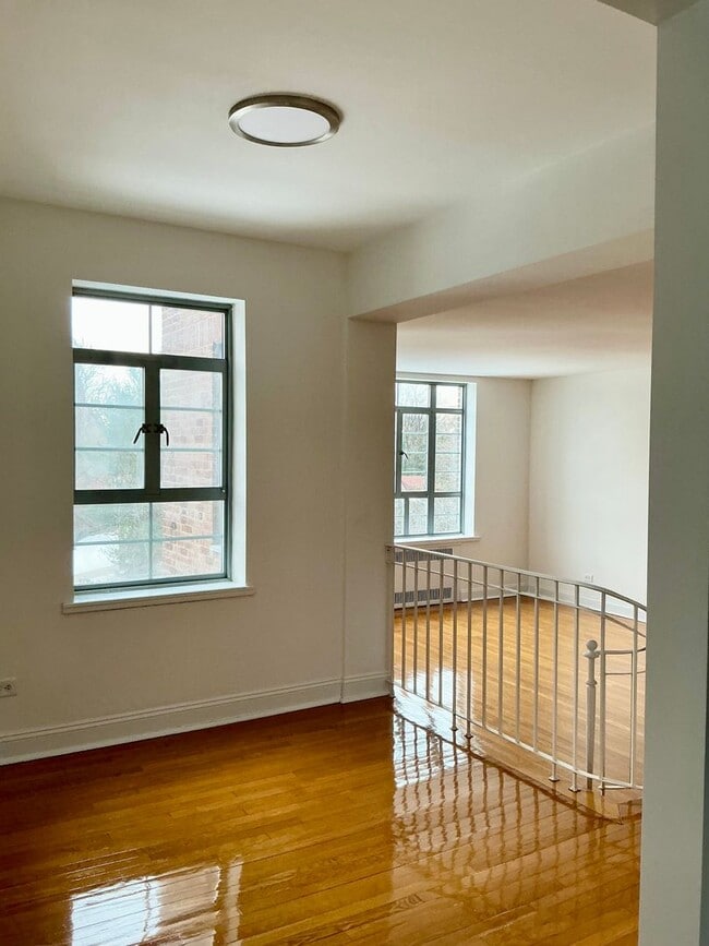 Building Photo - The Leslie — A Private Garden Enclave for the Modern New Yorker