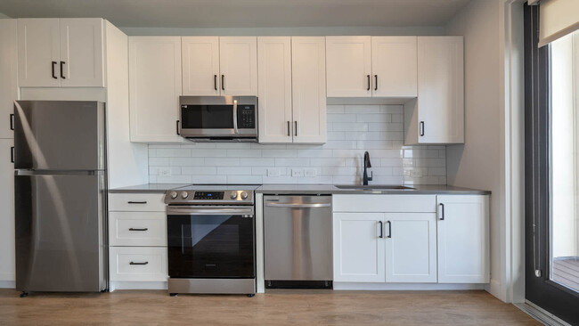 Kitchen with Stainless Steel Appliances - White Fence Farm