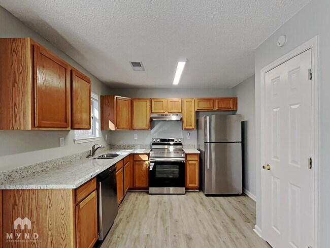 Foto del edificio - 7010 Mahogany Dr