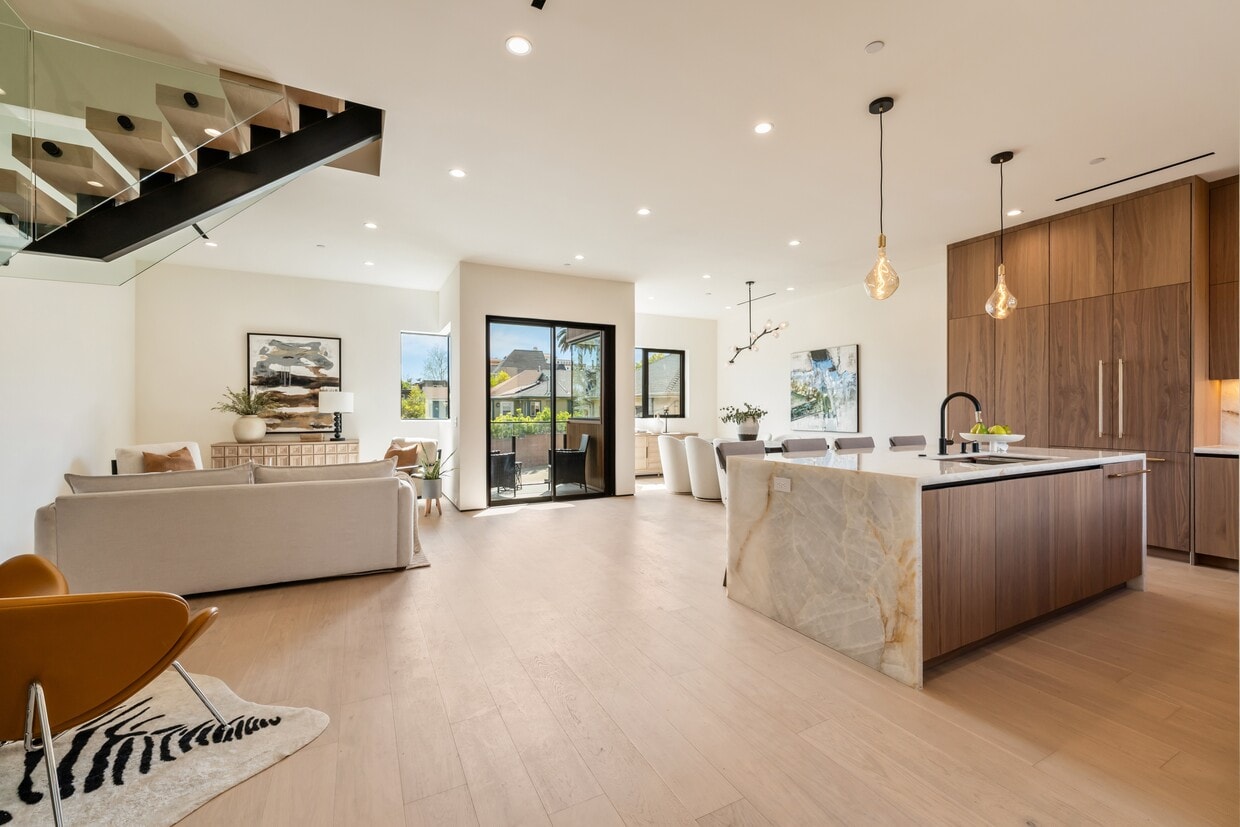 Main floor filled with natural light and an inviting open-concept layout - 836 Waterloo St