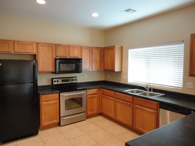 Building Photo - 10121 W Luxton Ln