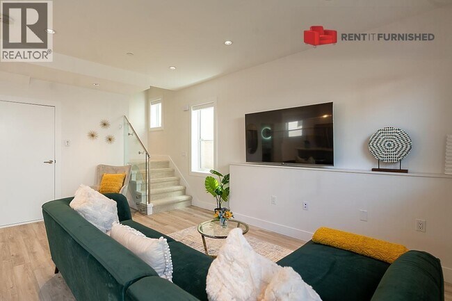Photo du bâtiment - 3143 E 8th Ave