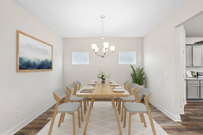 Elegante comedor con una mesa de madera noble y asientos atemporales, diseñado para reuniones familiares inolvidables. - Southwind