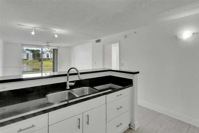 Building Photo - 4350 NW 107th Avenue 108, Doral, FL 33178